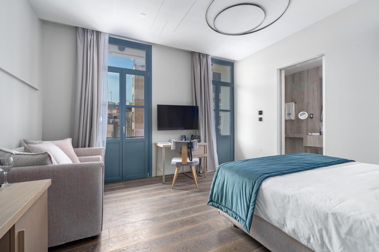 Hellenic Vibes Smart Hotel Athen Exterior foto A room at the hotel