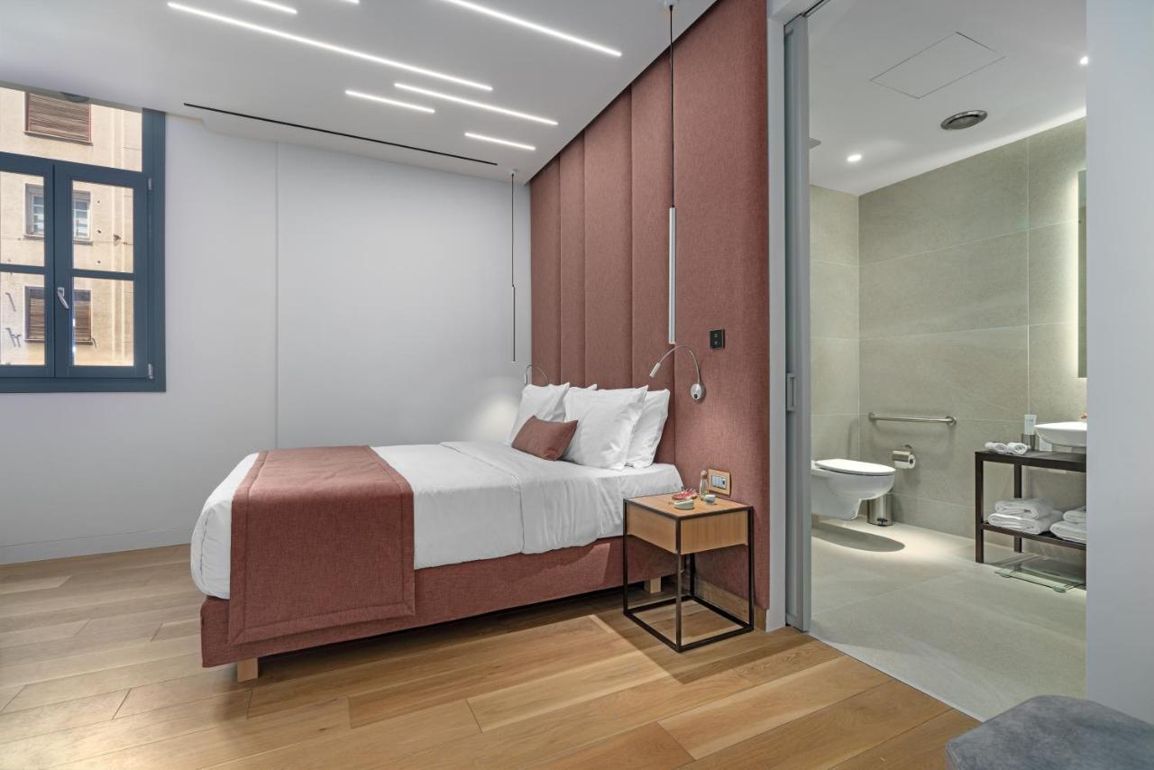 Hellenic Vibes Smart Hotel Athen Exterior foto A bedroom at the hotel