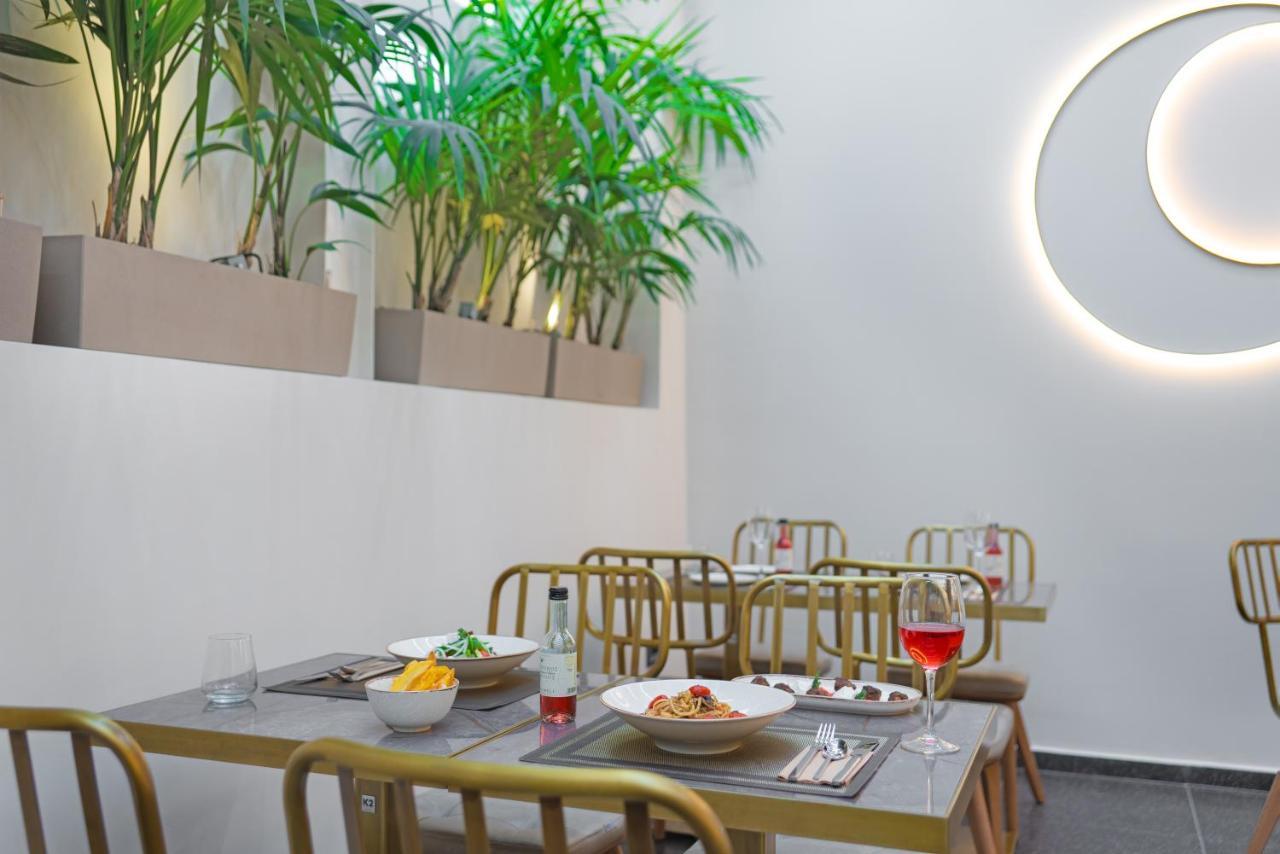 Hellenic Vibes Smart Hotel Athen Exterior foto Restaurant